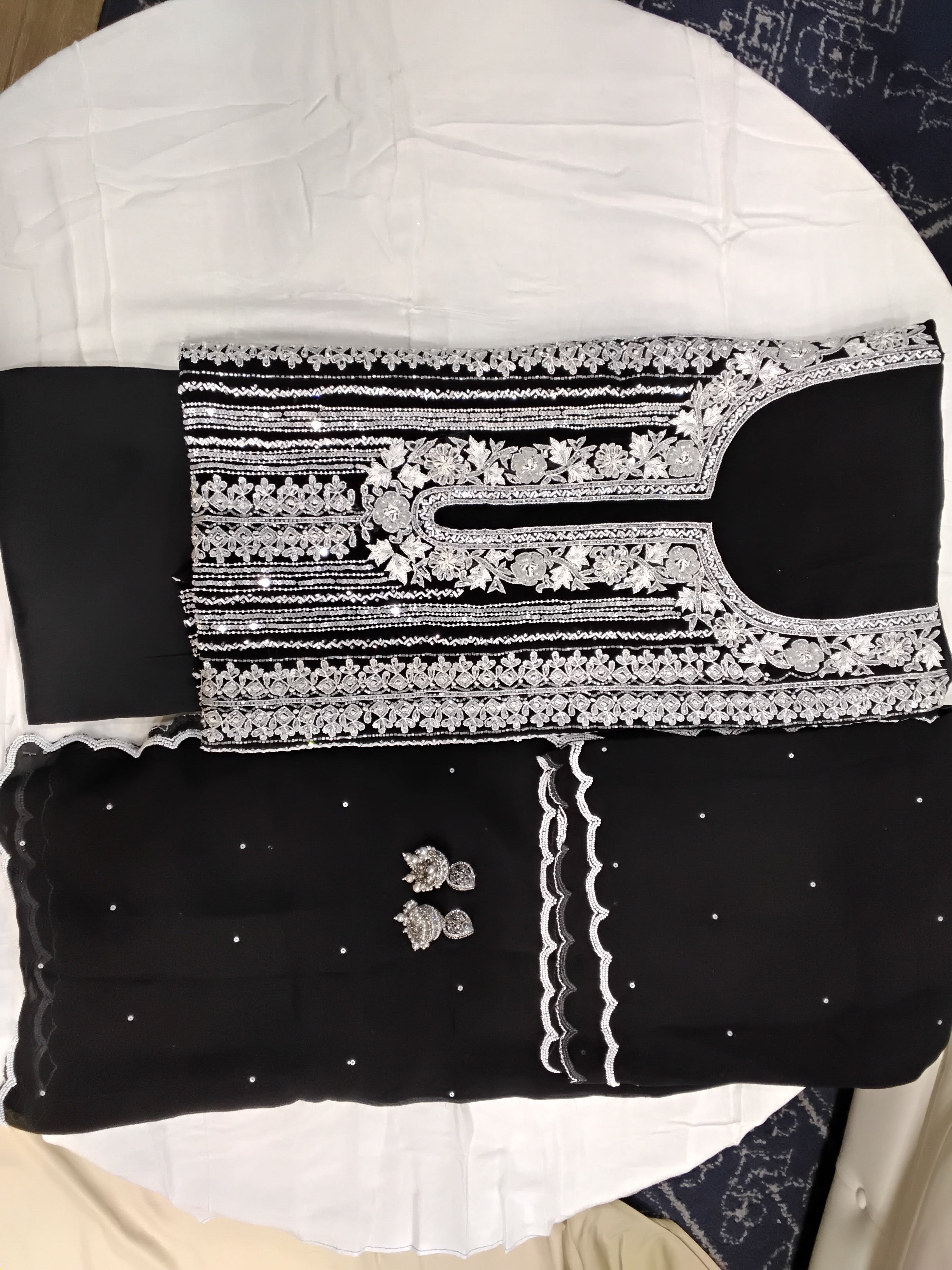 Black with White unstitched suit