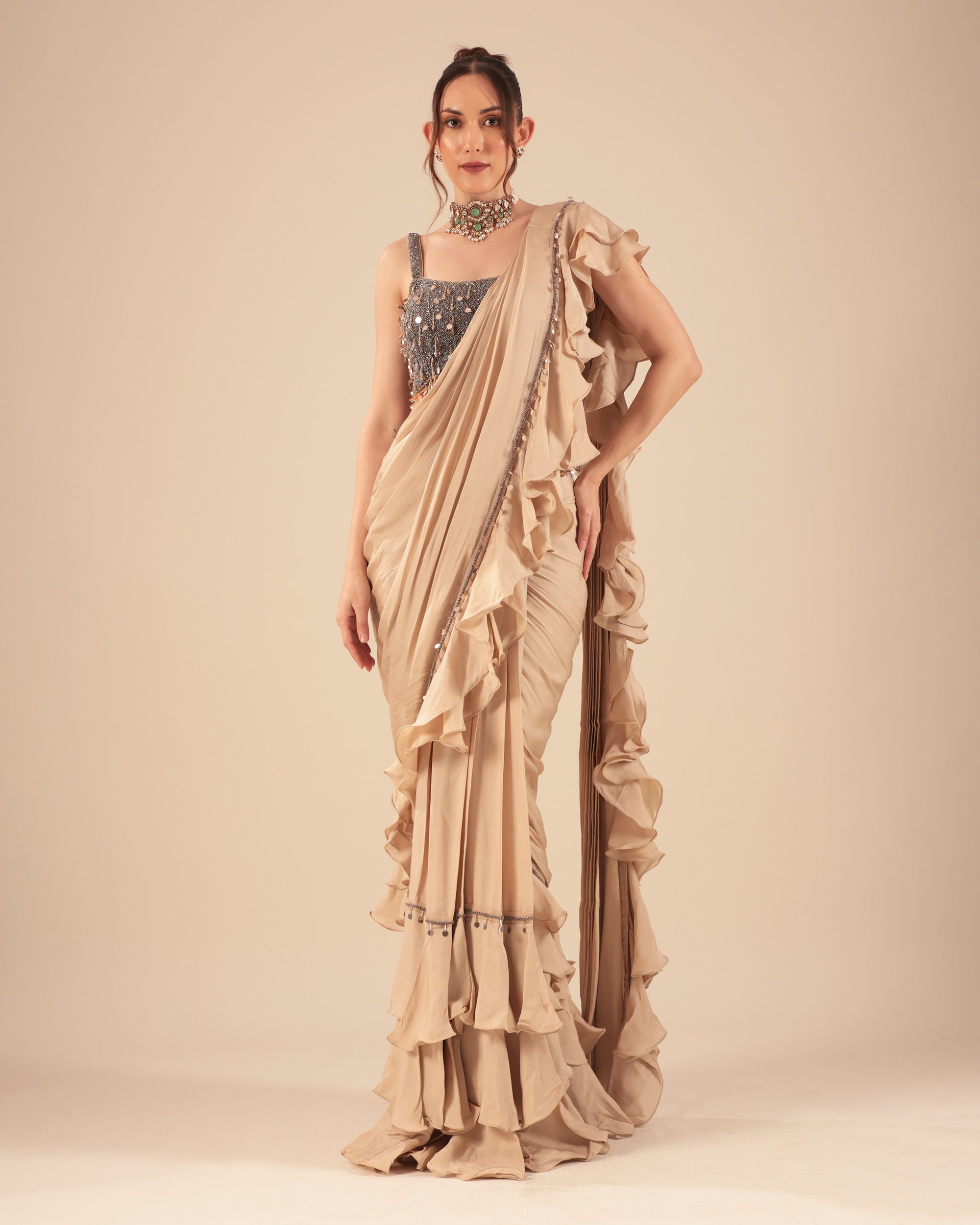 Beige Ruffle Drape Saree with Mirror Work Blouse
