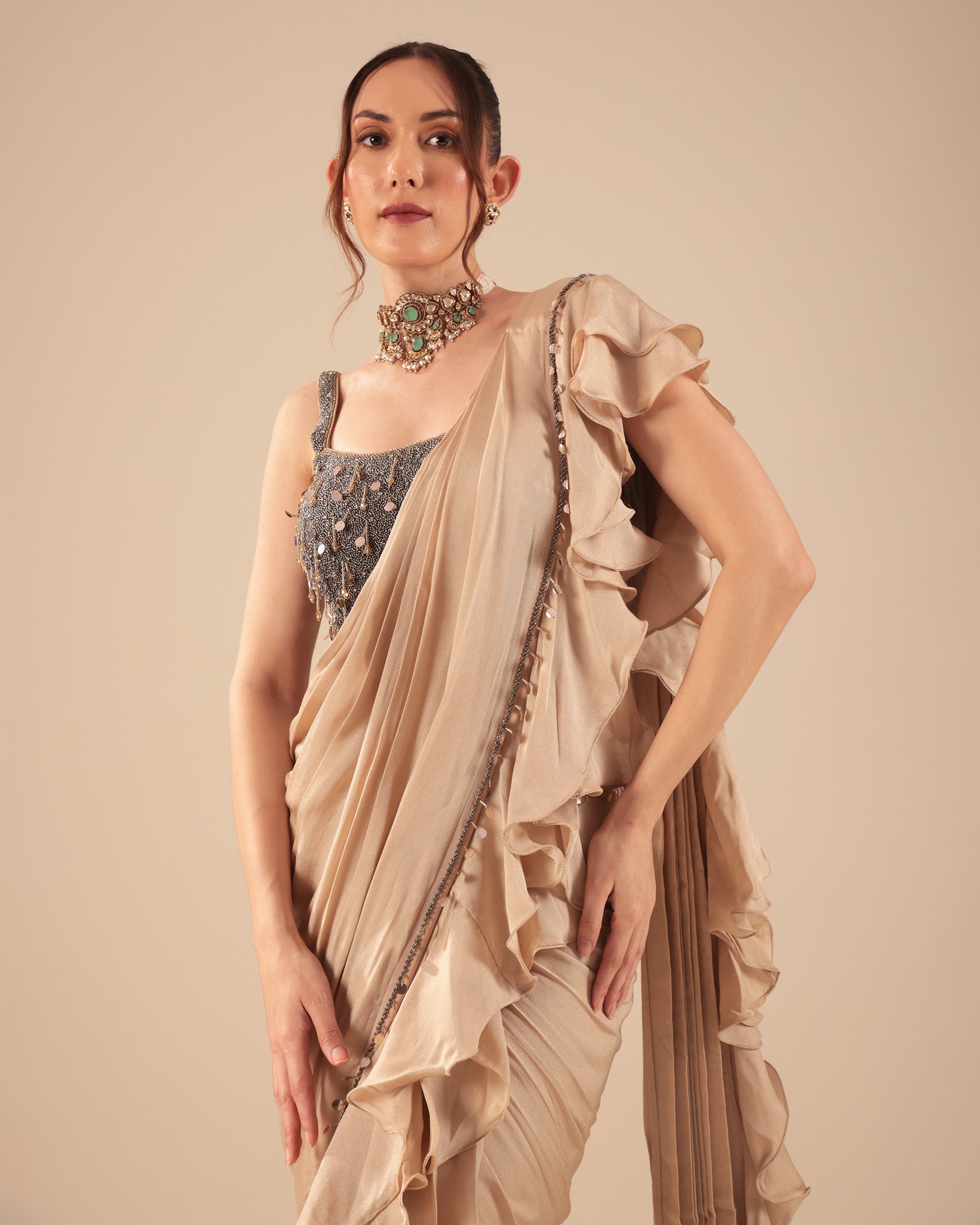 Beige Ruffle Drape Saree with Mirror Work Blouse