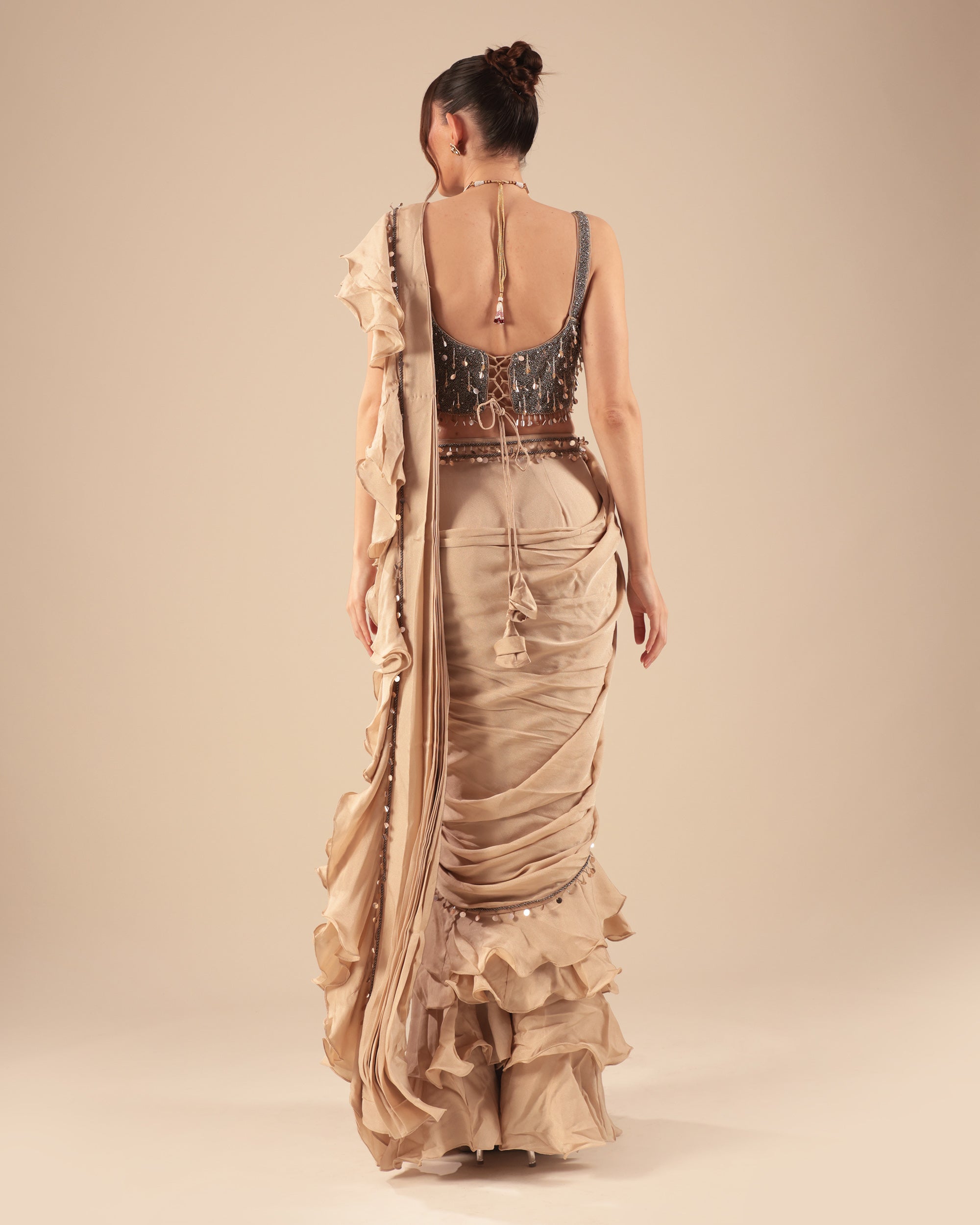 Beige Ruffle Drape Saree with Mirror Work Blouse