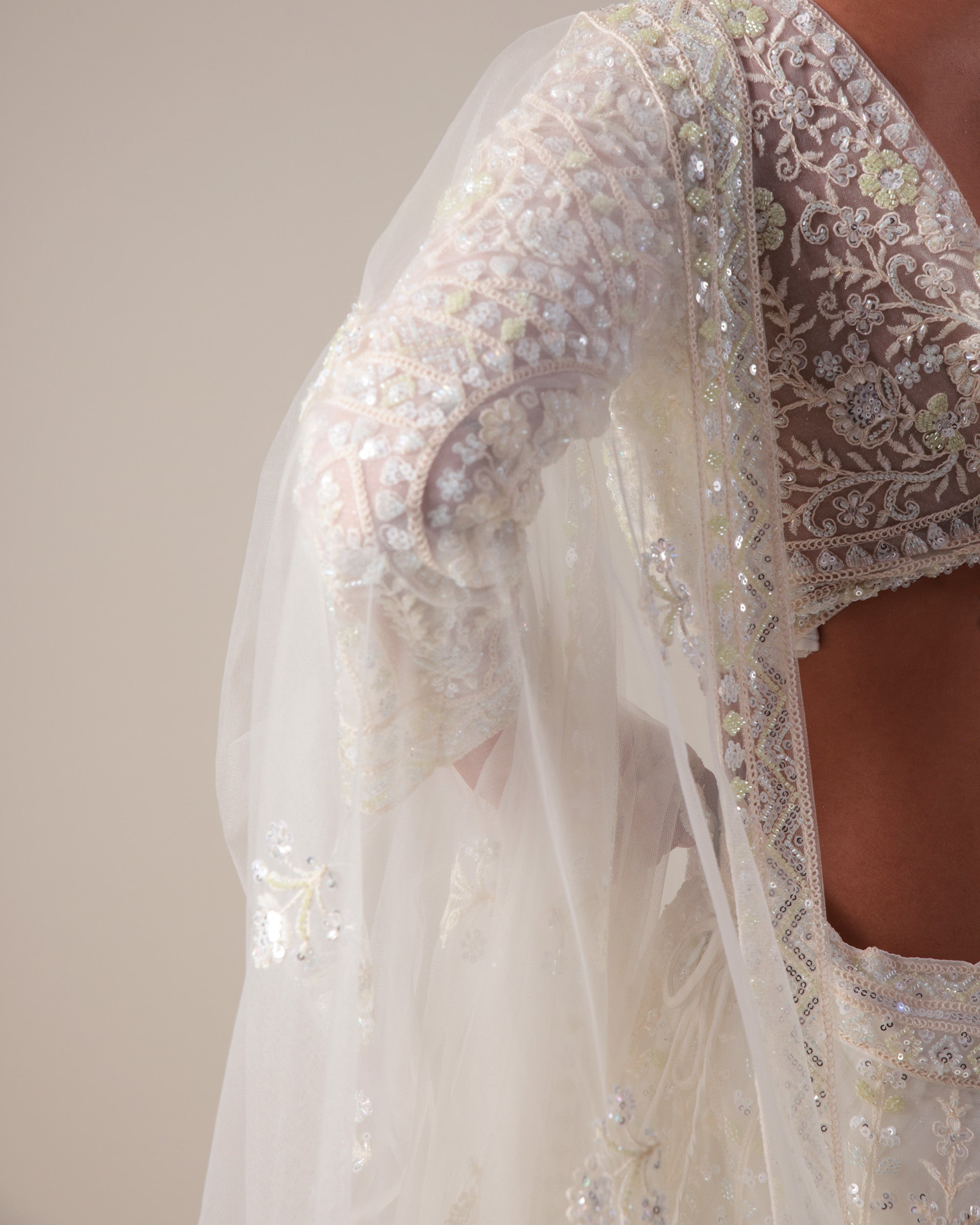 Ivory Embellished Lehenga with V-Neck Blouse & Dupatta